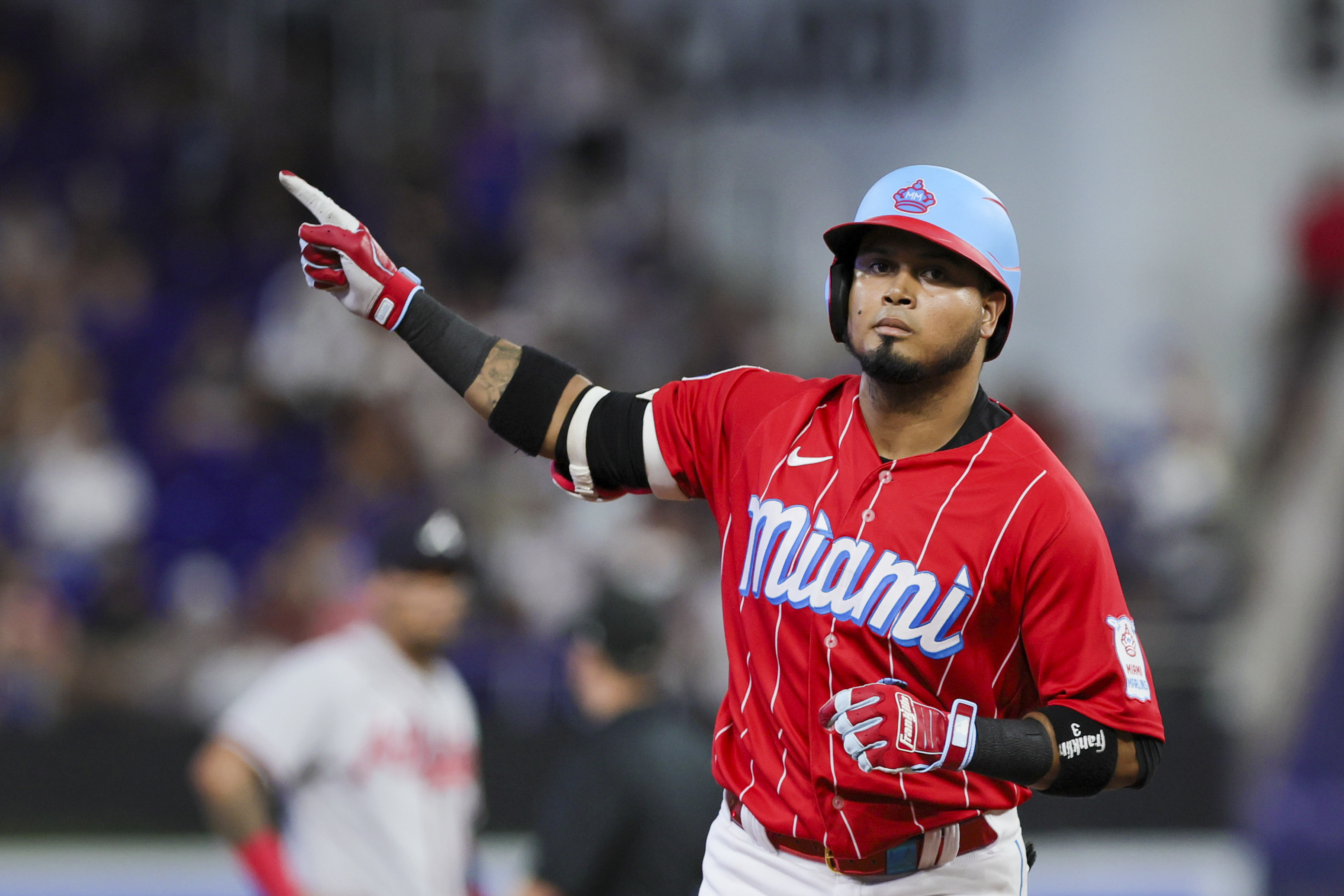Sep 16, 2023; Miami, Florida, USA; Miami Marlins second baseman Luis Arraez (3) circles the bases after hitting a home run against the Atlanta Braves during the first inning at loanDepot Park.